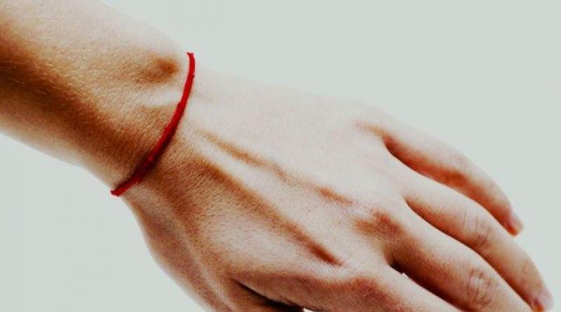 Красная нить на руке: магия, значение, как правильно её носить, где купить